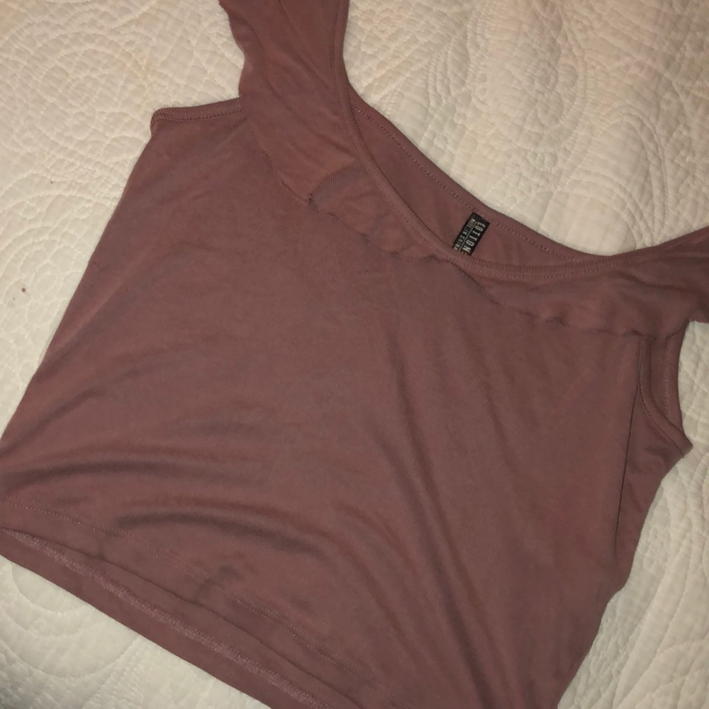 A off the shoulder crop top in a dusty purple/pink